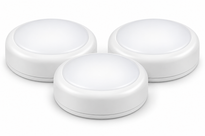 three white puck lights